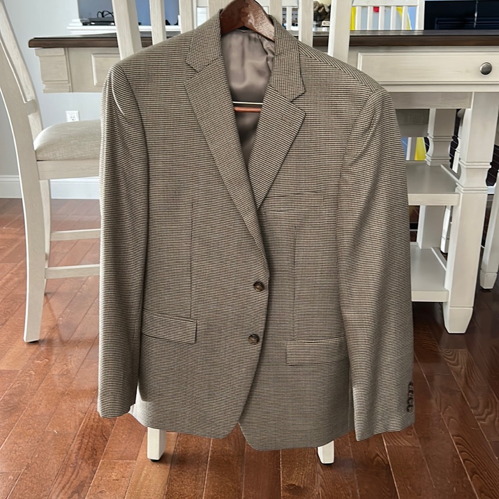 Like new Ralph Lauren sport coat/blazer. Worn only once. Size 42R.